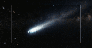 Ilustração realista do cometa 3I Atlas viajando pelo espaço interestelar.